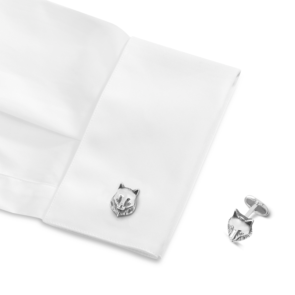 Cufflinks, wolf-head design in sterling silver